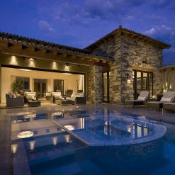 home-trends-2014-green-cutting-edge-technological-luxurious-and-entertaining-slate-stone-exterior-wall-small-luxury-home-design-with-infinity-pool-lounge-and-lighting-ideas